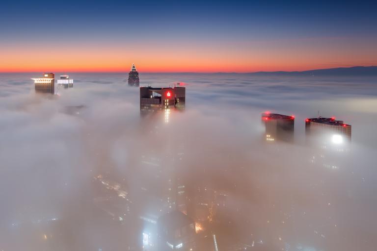 Sea of clouds with buildings 