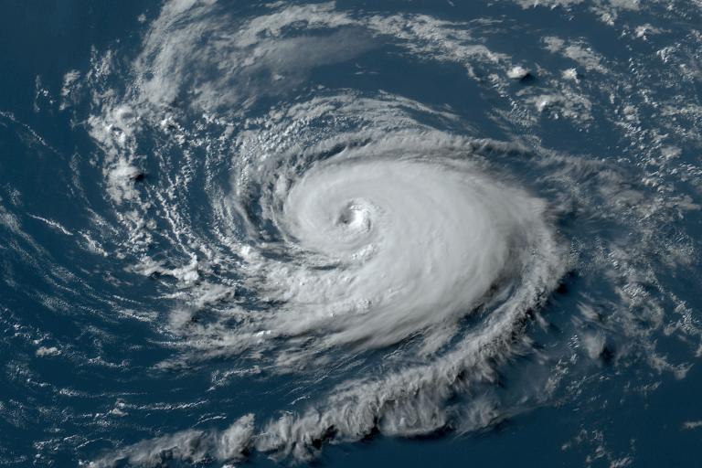 A satellite image of a hurricane in the ocean.