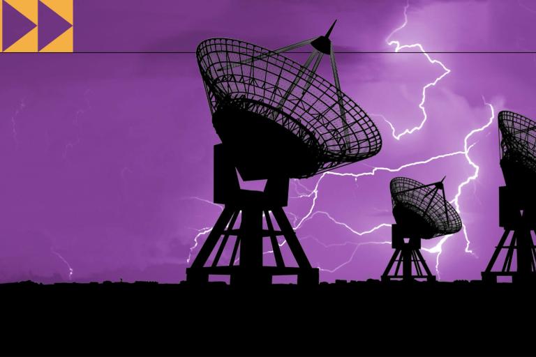 A purple background with satellite antennas in the foreground.