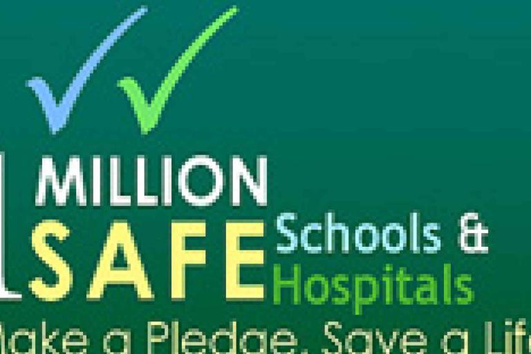 Logo with two check marks and text: "1 Million Safe Schools & Hospitals. Make a Pledge. Save a Life." on a green background.