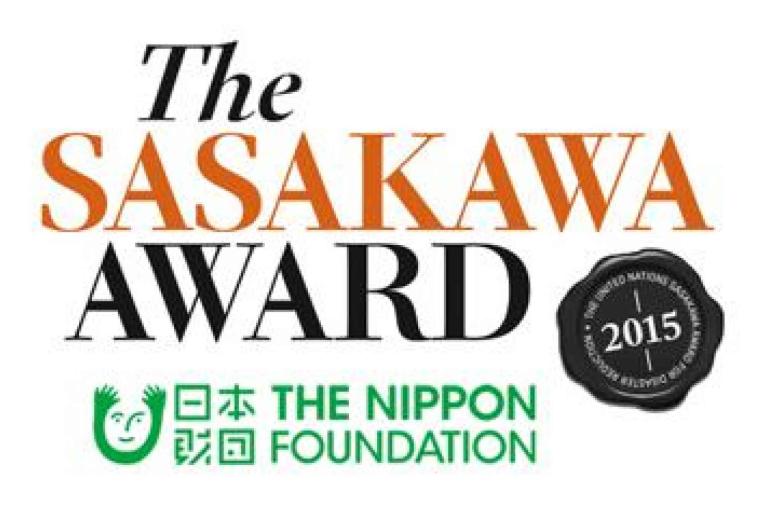 Logo for the Sasakawa Award, featuring The Nippon Foundation logo and a black seal indicating the year 2015 and the United Nations Sasakawa Award.