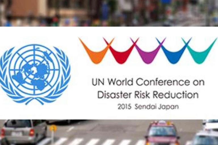 Logo and text for the UN World Conference on Disaster Risk Reduction 2015 in Sendai, Japan, with colorful symbols and the UN emblem.