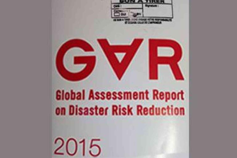 Cover of the 2015 Global Assessment Report on Disaster Risk Reduction, featuring a large red "GAR" acronym and title text.