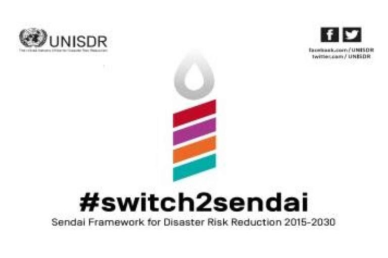 A stylized candle with colorful stripes and a grey flame above the text "#switch2sendai Sendai Framework for Disaster Risk Reduction 2015-2030" and UNISDR branding.