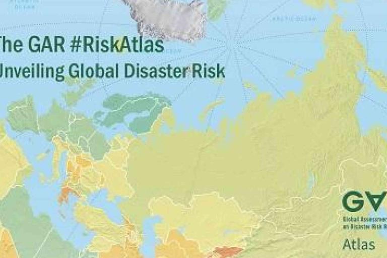 A map of Europe and Asia with the text: "The GAR #RiskAtlas Unveiling Global Disaster Risk" and "GAR Global Assessment Report on Disaster Risk Reduction Atlas.
