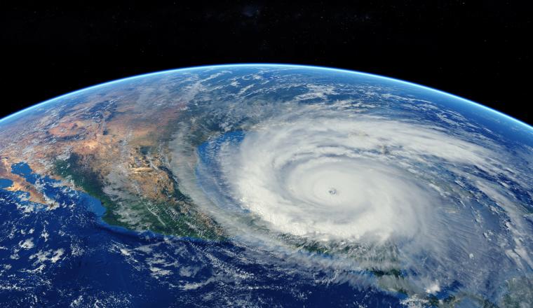 Hurricane approaching the American continent visible above the Earth, a view from the satellite. 