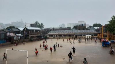 Children play in monsoon flooded school in Bangladesh