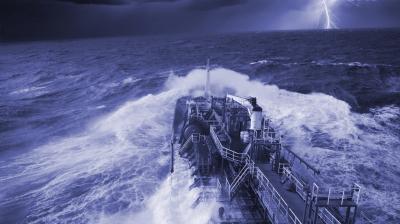 A ship in rough seas navigates through dark, stormy conditions with lightning flashing in the distant sky.