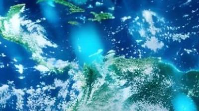 Satellite view of the Caribbean Sea, showing parts of Central America, northern South America, and several Caribbean islands under scattered clouds.