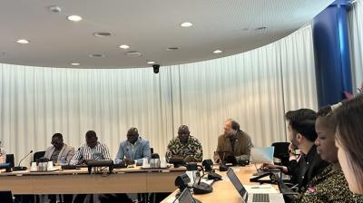 Photo of the speakers and audience during the TCI Learning Event on Togo 