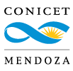 A blue infinity symbol with a yellow sunburst on the right side, set against a transparent background.