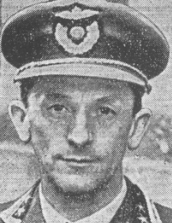 An old photo of a man in uniform.
