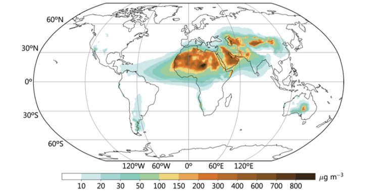 World map showing concentrations of airborne particulates, with highest levels over North Africa, the Middle East, and parts of Asia; color scale indicates particle density in µg/m³.