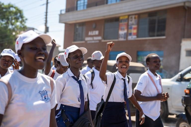 Young women take part in a march to raise awareness of disaster risk in Juba, South Sudan.