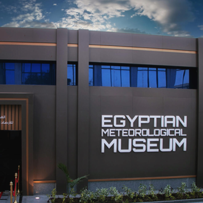 Exterior view of the Egyptian Meteorological Museum building with its main entrance and museum sign.